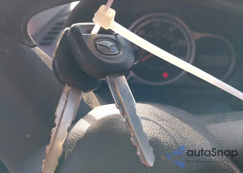 2012 Mazda Mazda2 Sport from USA, damaged, VIN JM1DE1KZ8C0150205